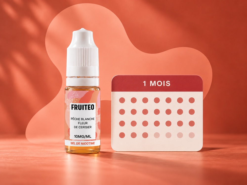 Un e-liquide Fruiteo 10 ml en sel de nicotine, à côté d'un calendrier d'un mois.